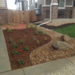 front yard landscape design with pebbles
