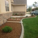 commercial landscape installation outside of house