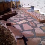 landscape design walkway with large rocks